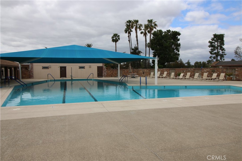 25669 Warwick Road Menifee, CA 92586 - Photo 26 of 36 a view of a house with a yard