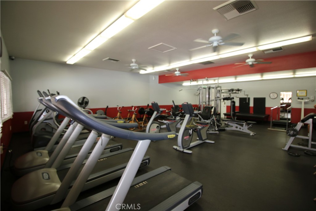 25669 Warwick Road Menifee, CA 92586 - Photo 34 of 36 a view of a room with gym equipment