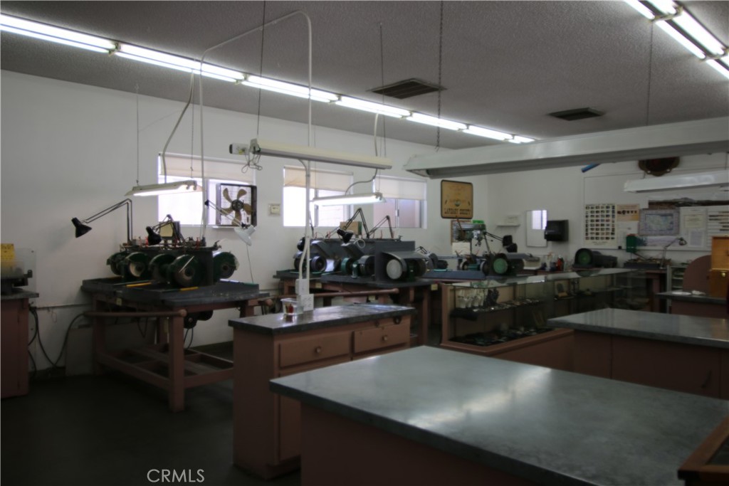 25669 Warwick Road Menifee, CA 92586 - Photo 36 of 36 a kitchen with counter space cabinets and appliances