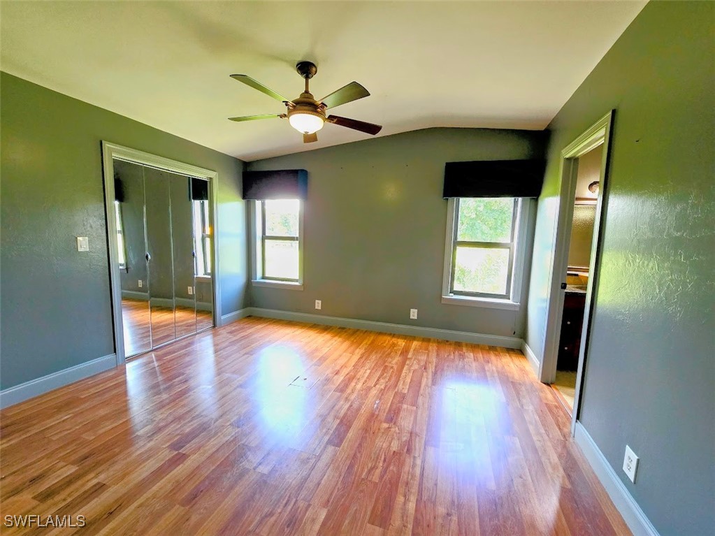 4650 County Road 78 LaBelle, FL 33935 - Photo 19 of 21 a view of livingroom with hardwood floor and window