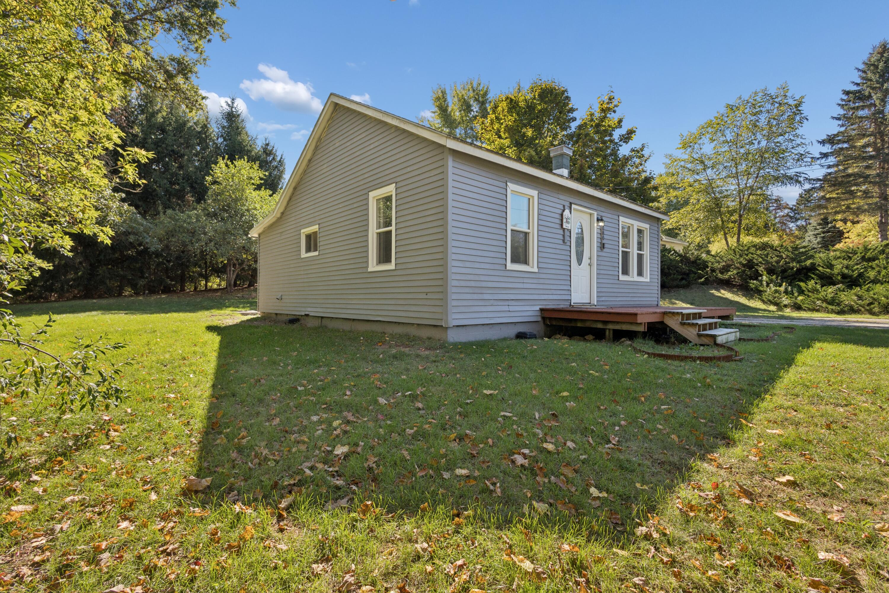 9080 Old Belding Road Northeast Rockford, MI 49341 - Photo 2 of 17 03-9080-Old-Belding-Rd-NE-WindowStill