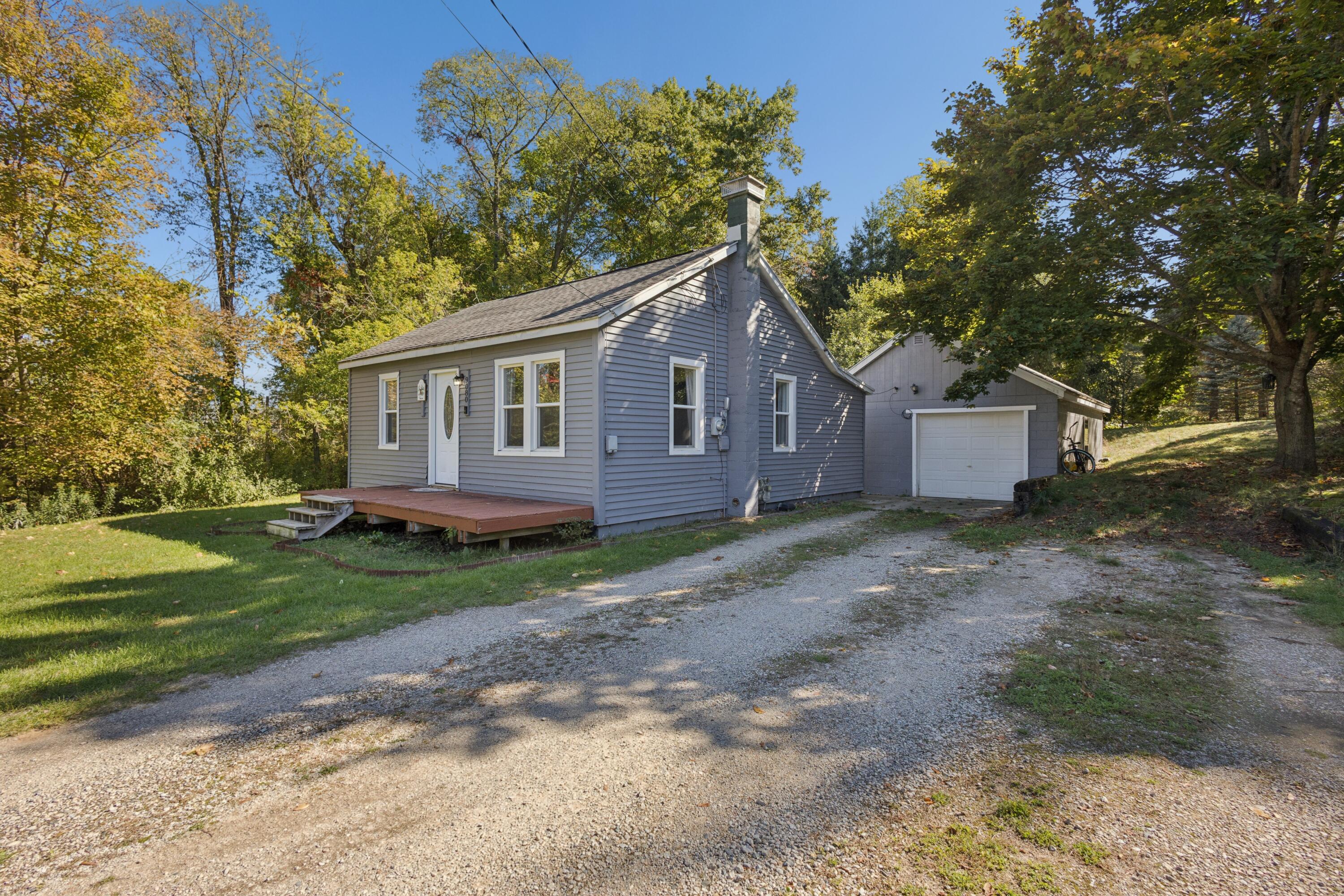 9080 Old Belding Road Northeast Rockford, MI 49341 - Photo 3 of 17 04-9080-Old-Belding-Rd-NE-WindowStill