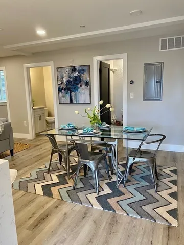 a workspace filed with furniture and window