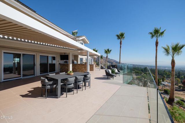 a living room with a fireplace furniture and a window