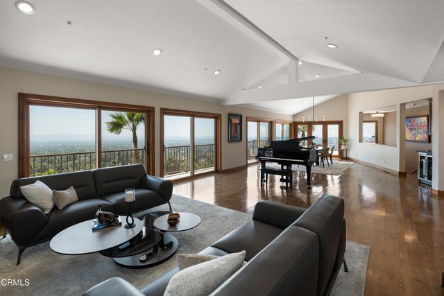a kitchen with a stove and a refrigerator
