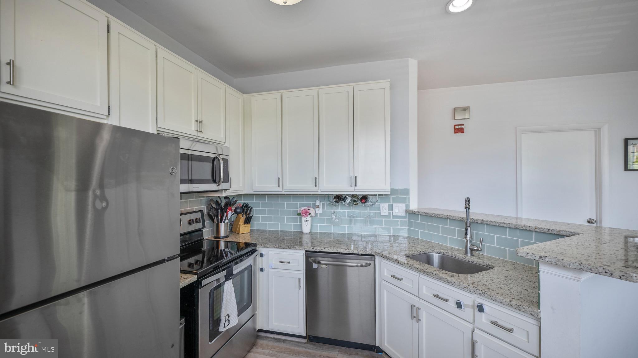 12708 Found Stone Road, Unit 3306 Germantown, MD 20876 - Photo 10 of 21 Updated counters and backsplash