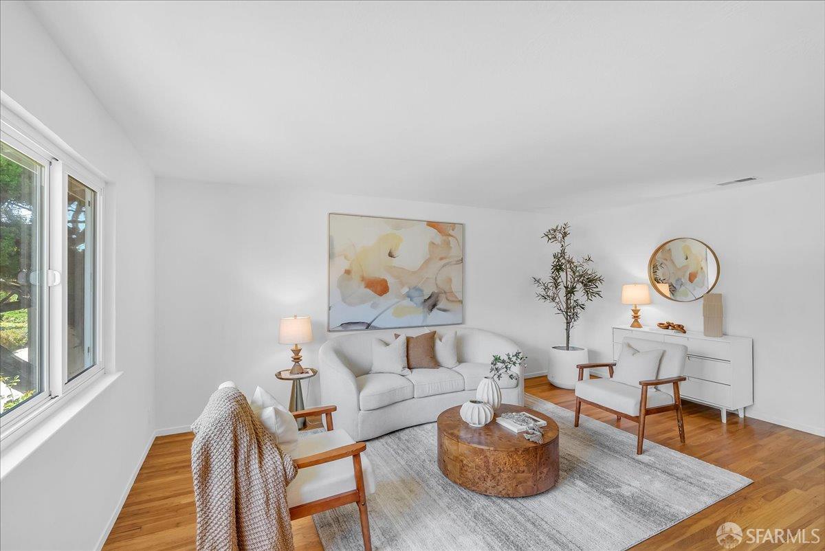 2083 Seacliff Drive Milpitas, CA 95035 - Photo 11 of 59 a living room with furniture a rug and a window