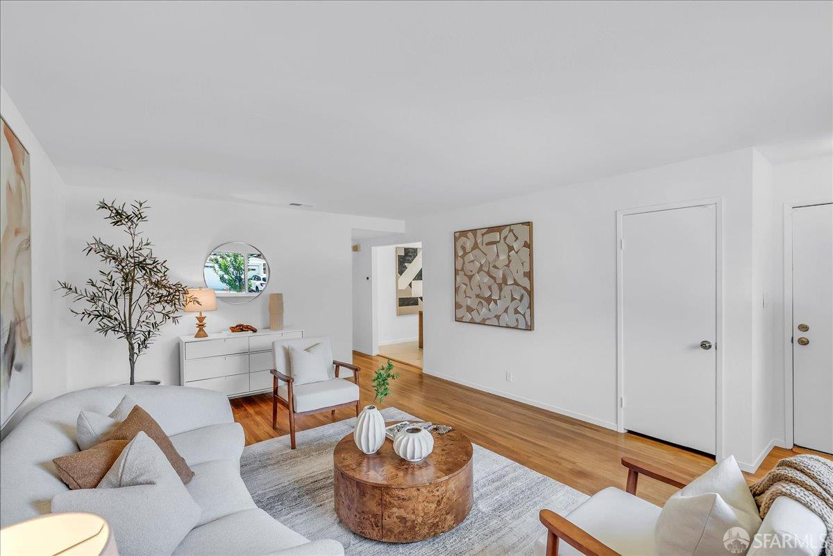 2083 Seacliff Drive Milpitas, CA 95035 - Photo 13 of 59 a living room with furniture and a potted plant