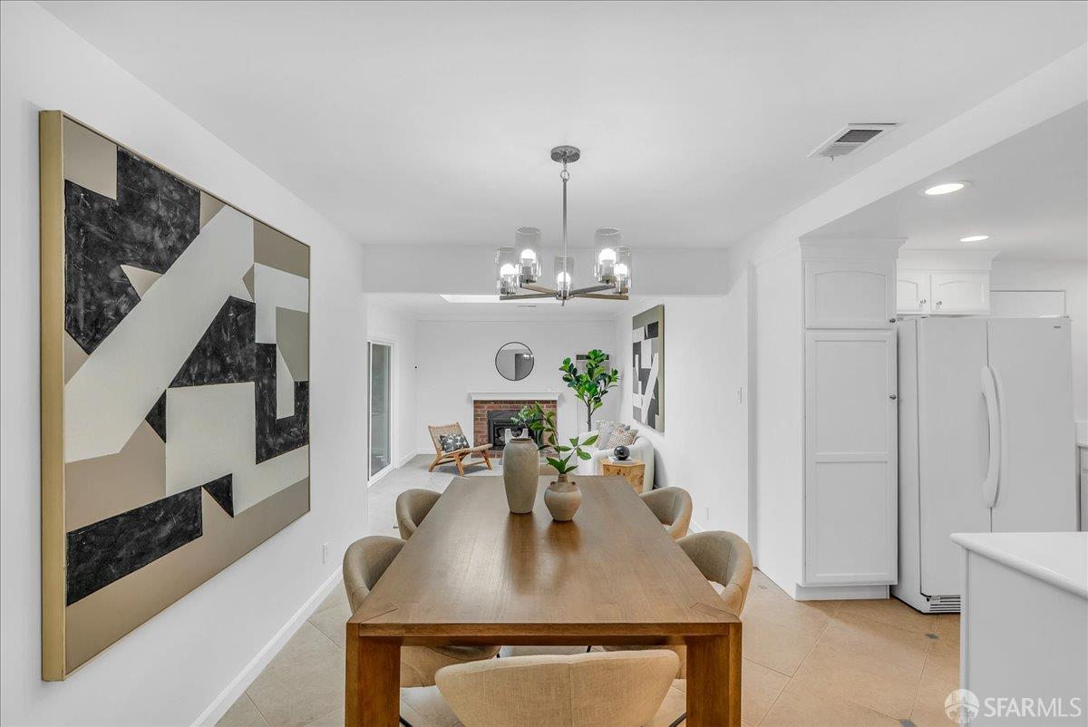 2083 Seacliff Drive Milpitas, CA 95035 - Photo 15 of 59 a view of a dining room with furniture and wooden floor