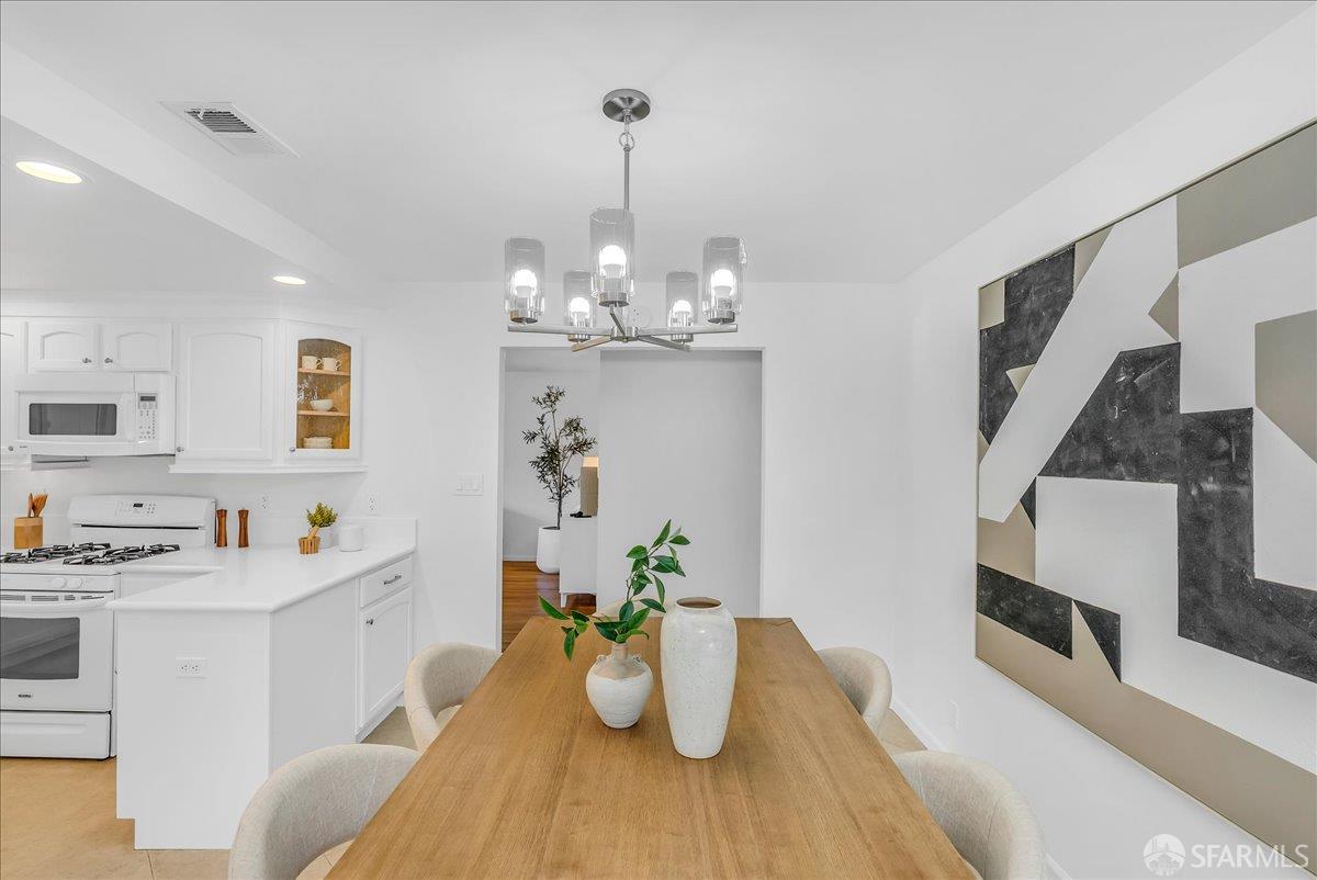 2083 Seacliff Drive Milpitas, CA 95035 - Photo 16 of 59 a kitchen that has a sink and cabinets