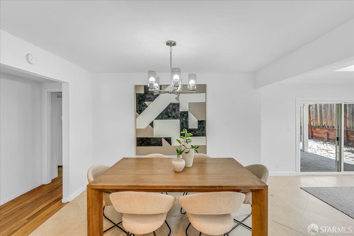 2083 Seacliff Drive Milpitas, CA 95035 - Photo 17 of 59 a view of a dining room with furniture and wooden floor