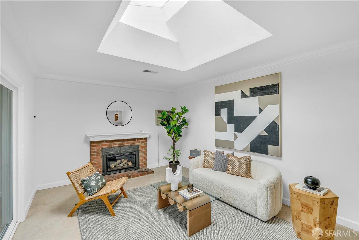 2083 Seacliff Drive Milpitas, CA 95035 - Photo 23 of 59 a living room with furniture and a fireplace