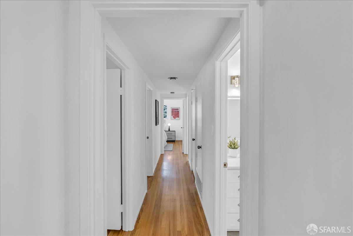 2083 Seacliff Drive Milpitas, CA 95035 - Photo 26 of 59 a view of a hallway with wooden floor and closet