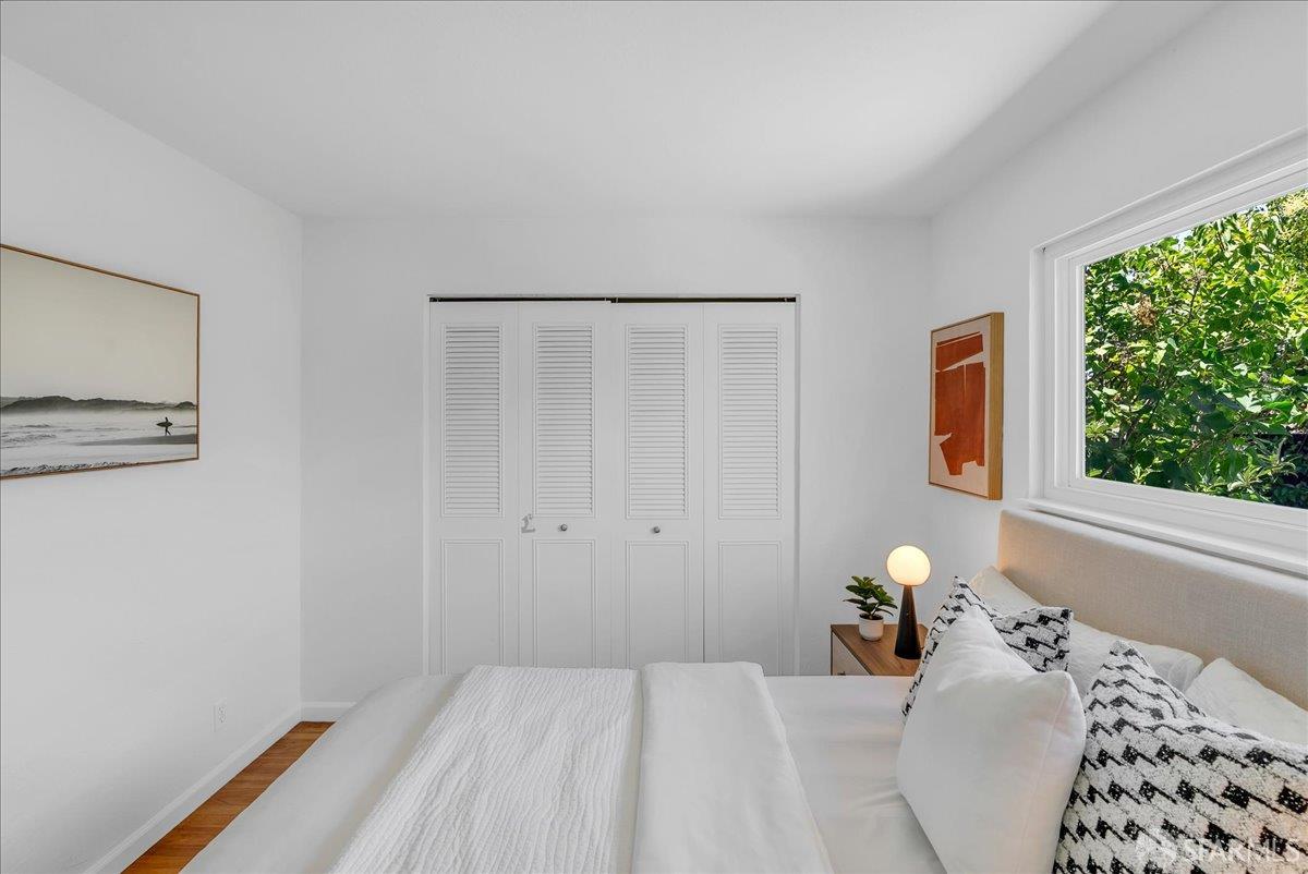 2083 Seacliff Drive Milpitas, CA 95035 - Photo 32 of 59 a bedroom with a bed and a window