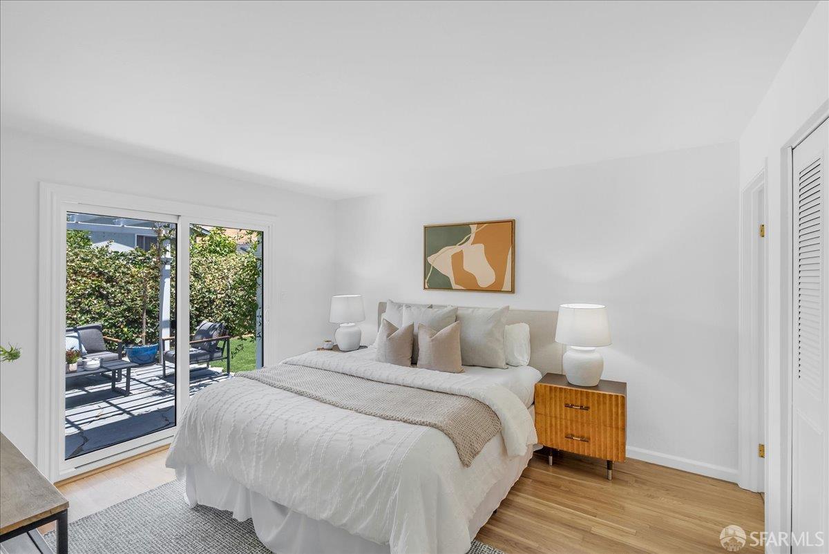 2083 Seacliff Drive Milpitas, CA 95035 - Photo 34 of 59 a bedroom with a bed and wooden floor