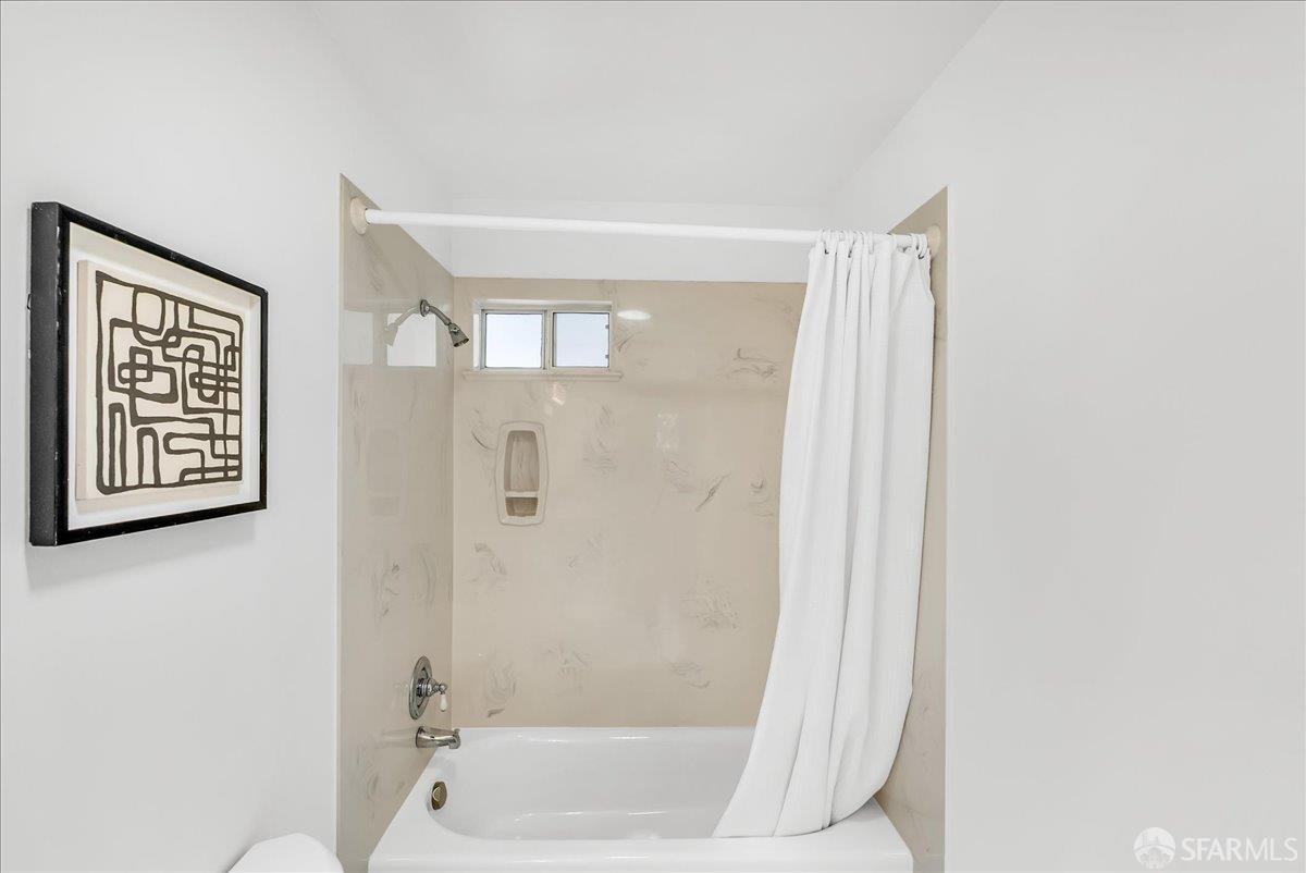 2083 Seacliff Drive Milpitas, CA 95035 - Photo 39 of 59 a bathroom with a bathtub and shower