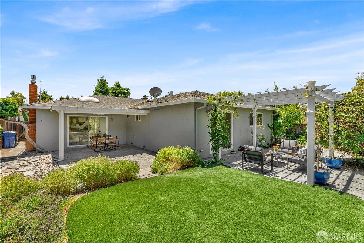 2083 Seacliff Drive Milpitas, CA 95035 - Photo 44 of 59 a backyard of a house with table and chairs