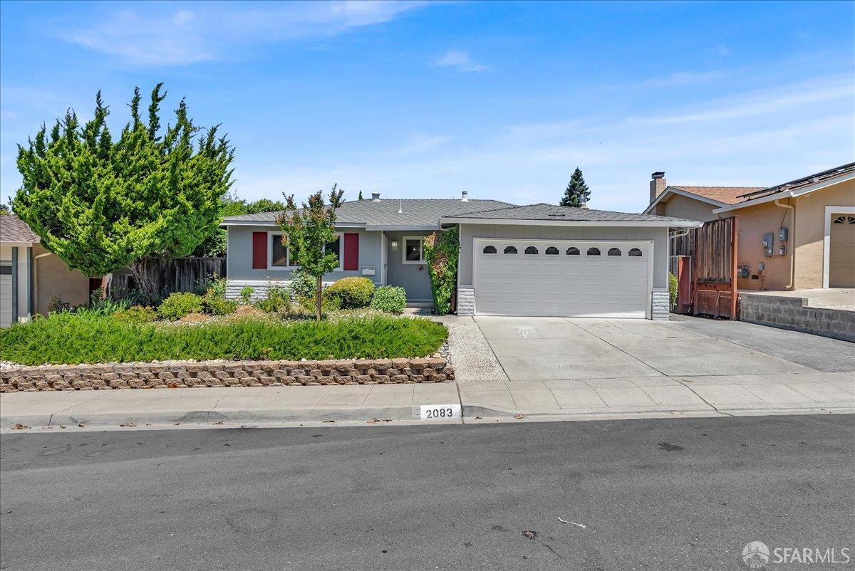 2083 Seacliff Drive Milpitas, CA 95035 - Photo 8 of 59 a front view of a house with a garden