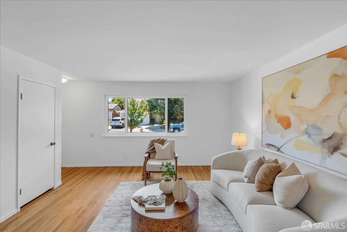 2083 Seacliff Drive Milpitas, CA 95035 - Photo 10 of 59 a living room with furniture and a wooden floor