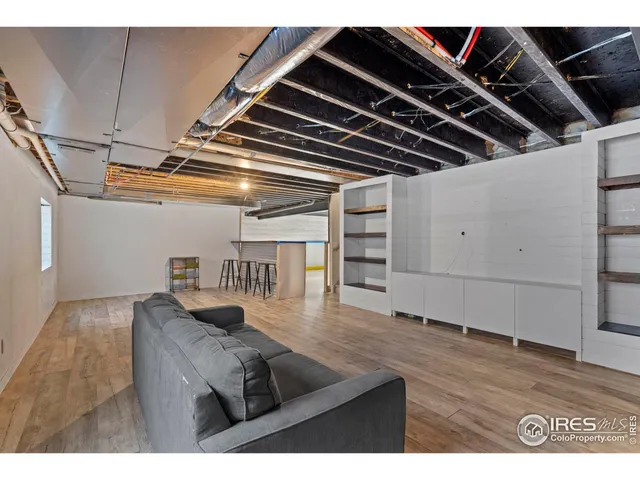 a view of wooden floor in an empty room