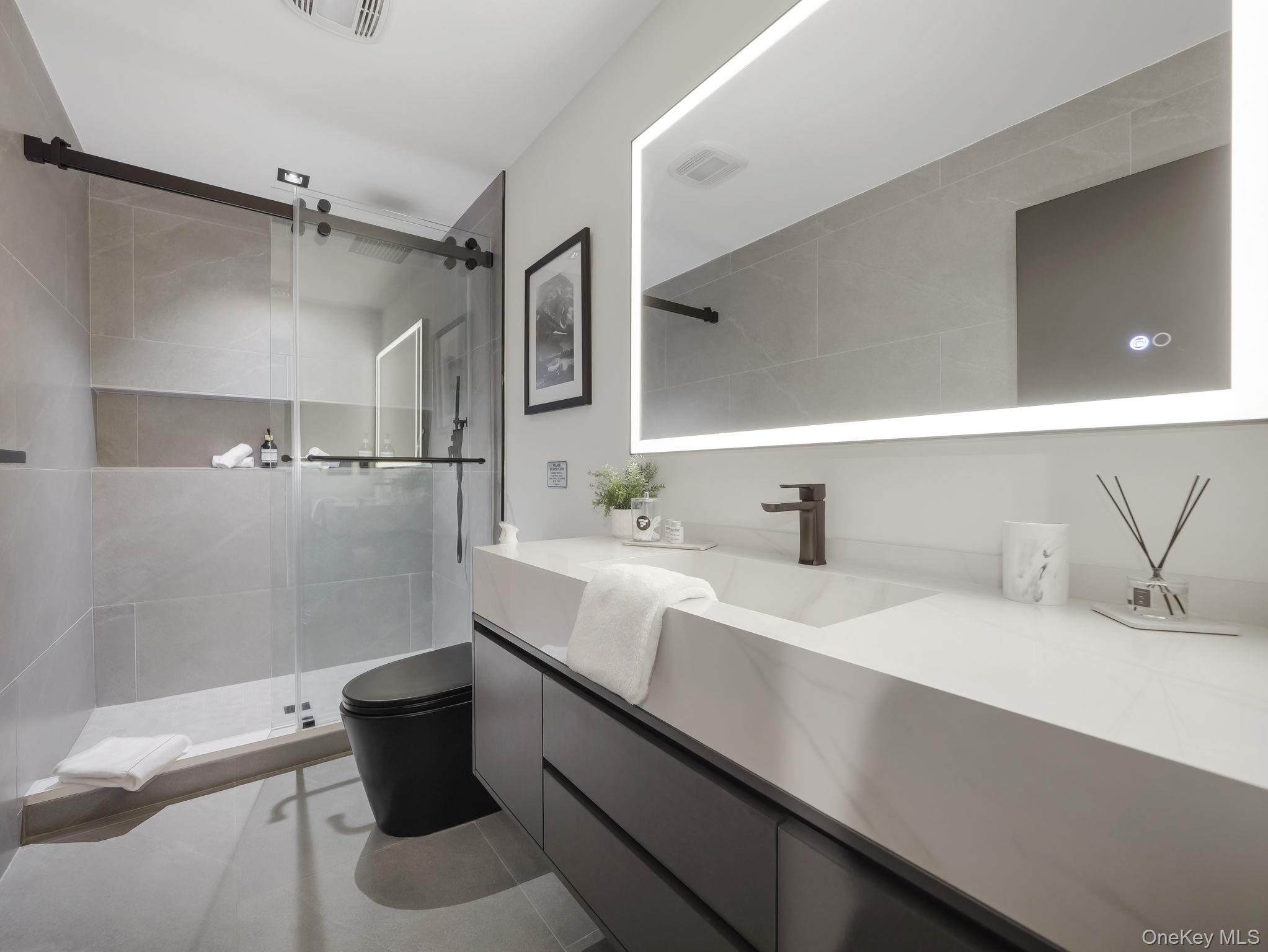 125 Mapes Road Barryville, NY 12719 - Photo 17 of 37 a bathroom with a sink and a mirror