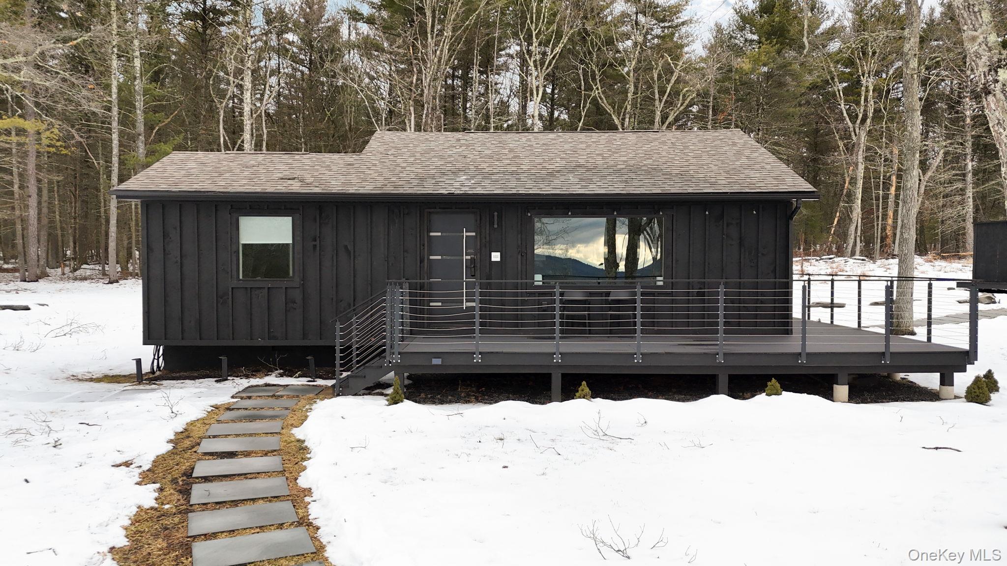 125 Mapes Road Barryville, NY 12719 - Photo 30 of 37 a front view of a house with a yard