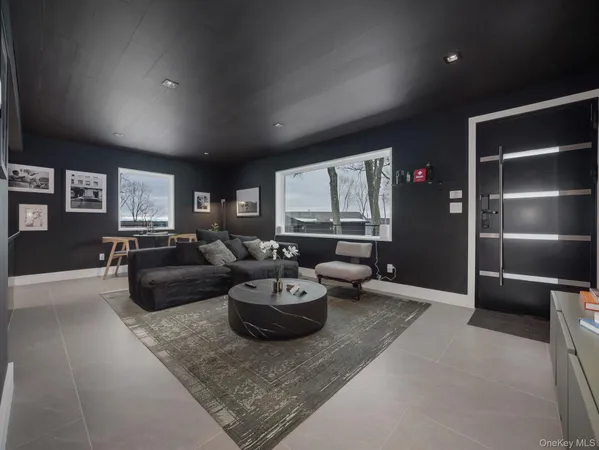 a kitchen with granite countertop a refrigerator oven a sink and dishwasher
