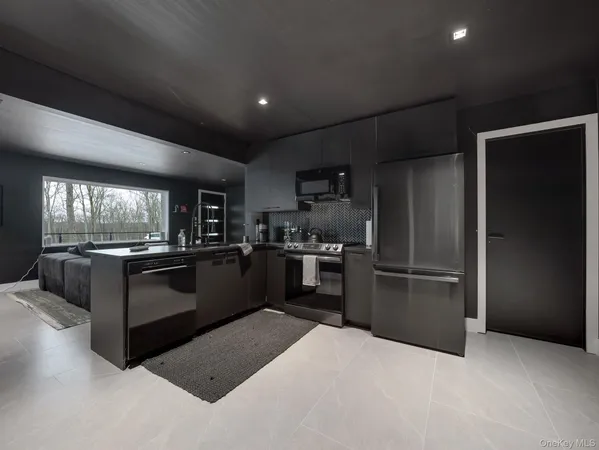 a bedroom with bed and window