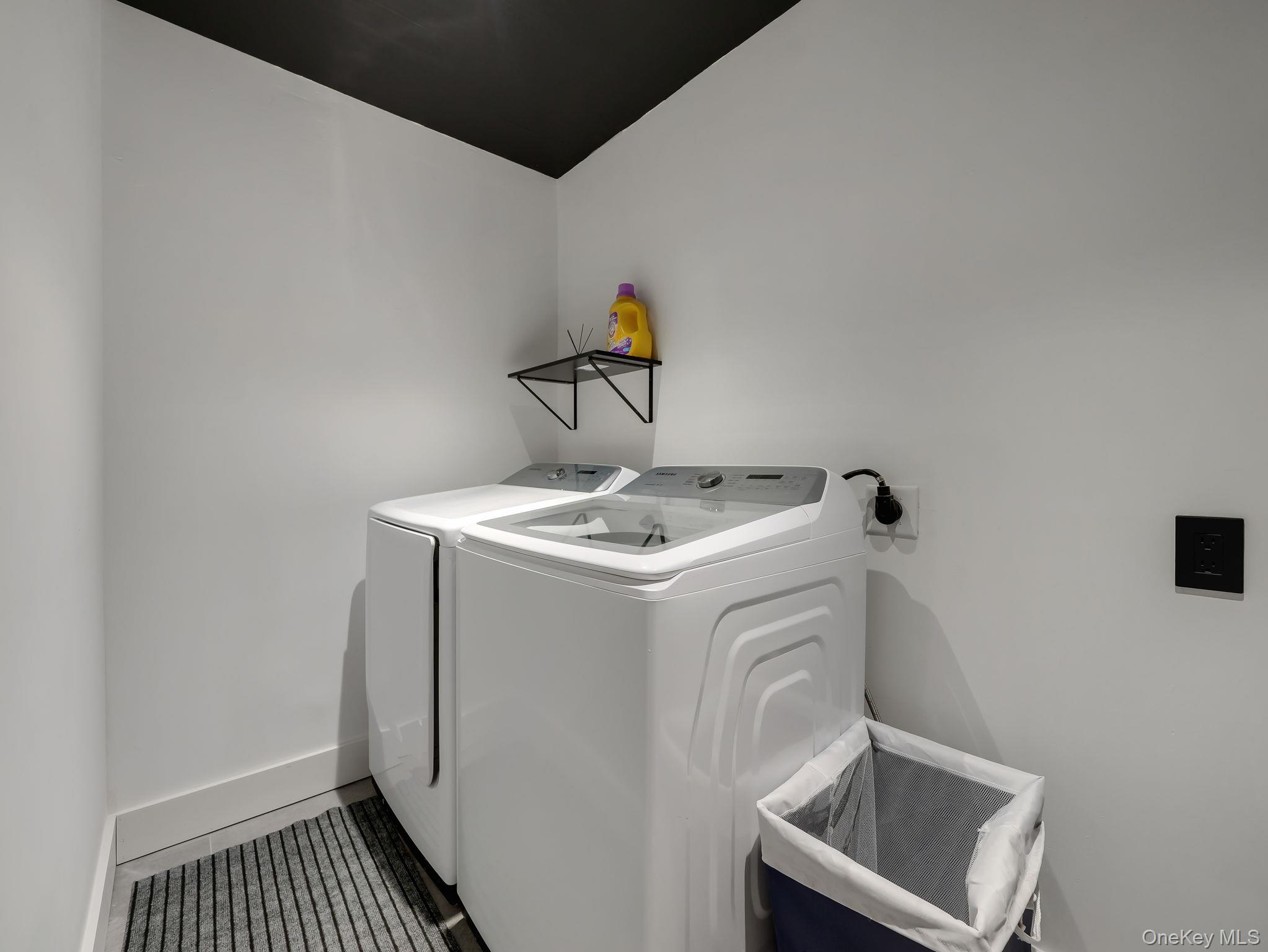 125 Mapes Road Barryville, NY 12719 - Photo 35 of 37 a utility room with dryer and washer