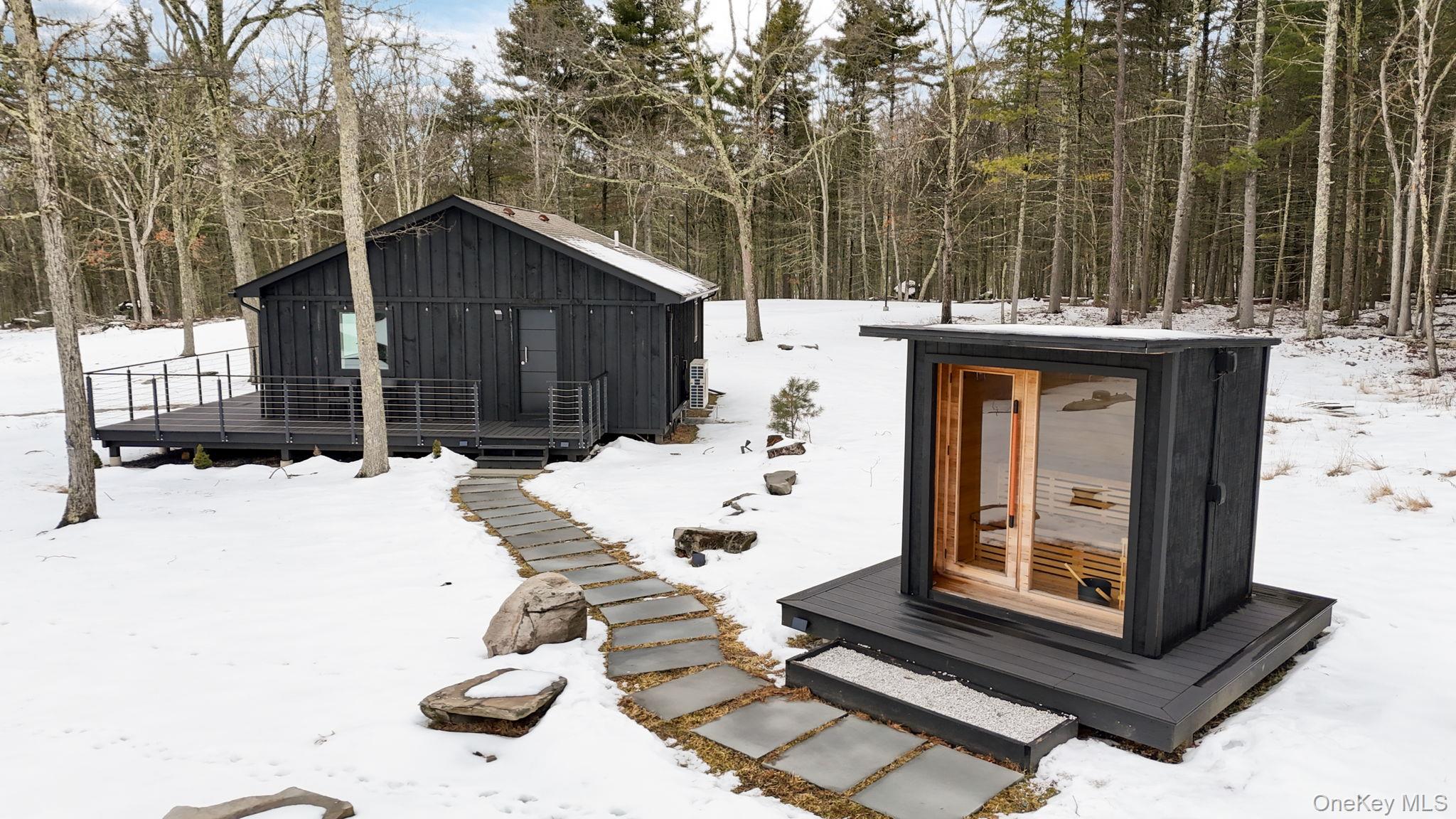 125 Mapes Road Barryville, NY 12719 - Photo 10 of 37 a view of a two chair in the patio