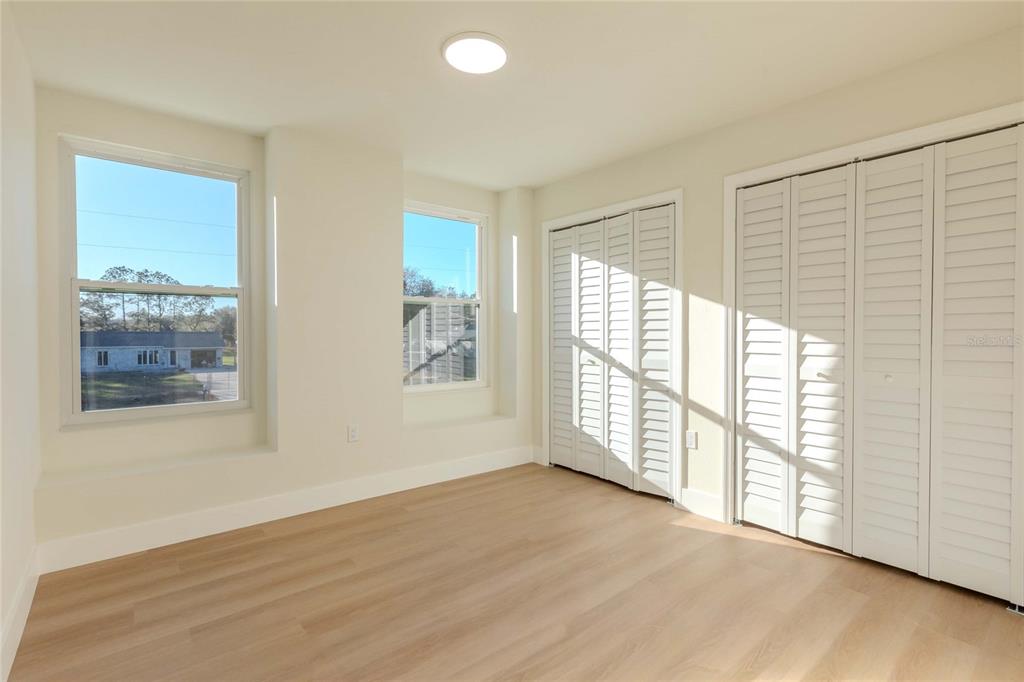 3324 Haystack Road Wesley Chapel, FL 33543 - Photo 13 of 91 a view of an empty room with a window