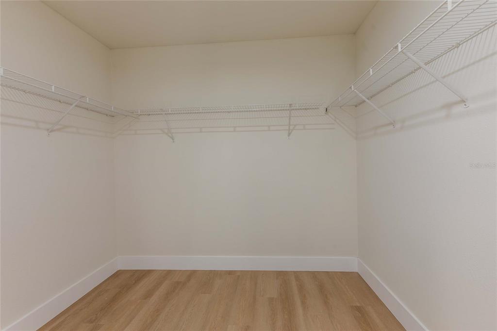 3324 Haystack Road Wesley Chapel, FL 33543 - Photo 20 of 91 a view of a room with wooden floor