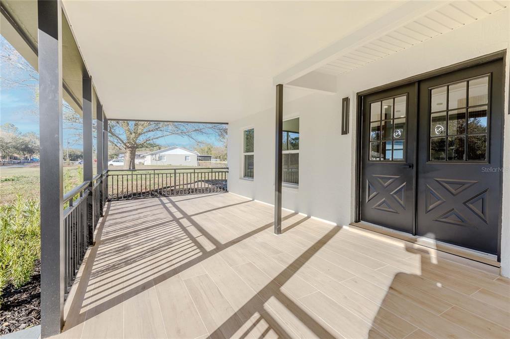 3324 Haystack Road Wesley Chapel, FL 33543 - Photo 26 of 91 a bedroom with a bed and a large window