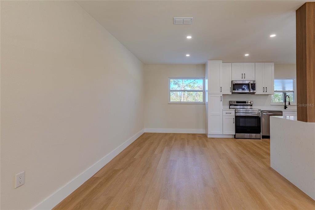 3324 Haystack Road Wesley Chapel, FL 33543 - Photo 28 of 91 a view of kitchen with sink and wooden floor