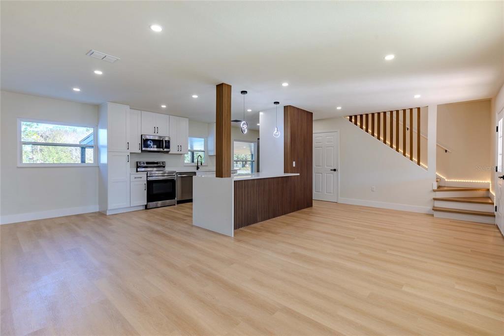 3324 Haystack Road Wesley Chapel, FL 33543 - Photo 4 of 91 a view of kitchen and wooden floor