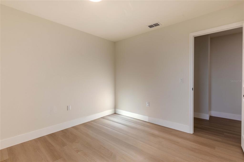 3324 Haystack Road Wesley Chapel, FL 33543 - Photo 52 of 91 a view of an empty room