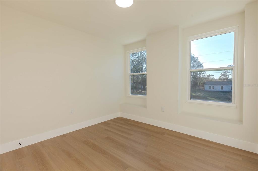 3324 Haystack Road Wesley Chapel, FL 33543 - Photo 53 of 91 an empty room with a window