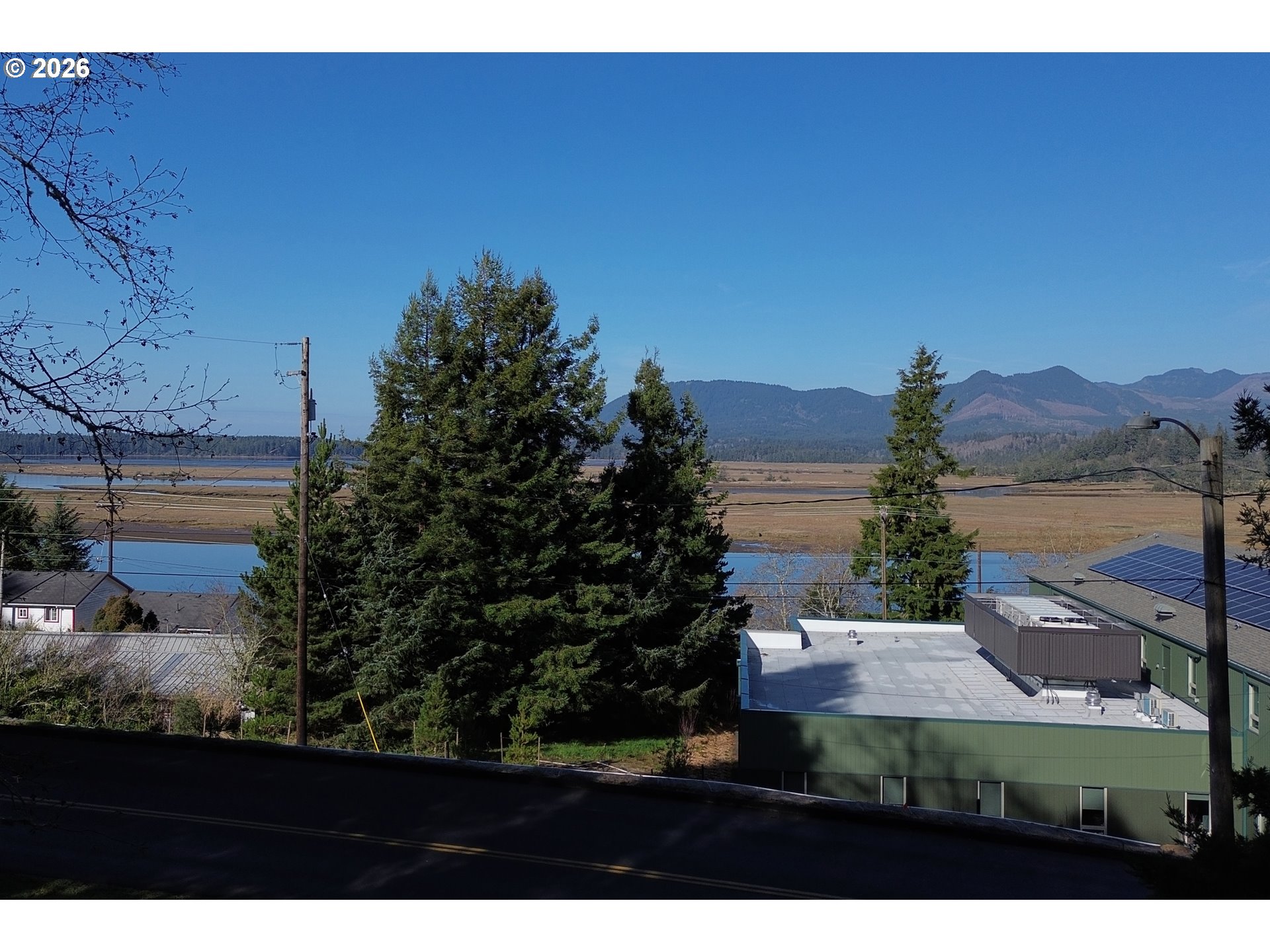 1st And Akin Wheeler, OR 97147 - Photo 11 of 41 a view of an outdoor space and mountain view