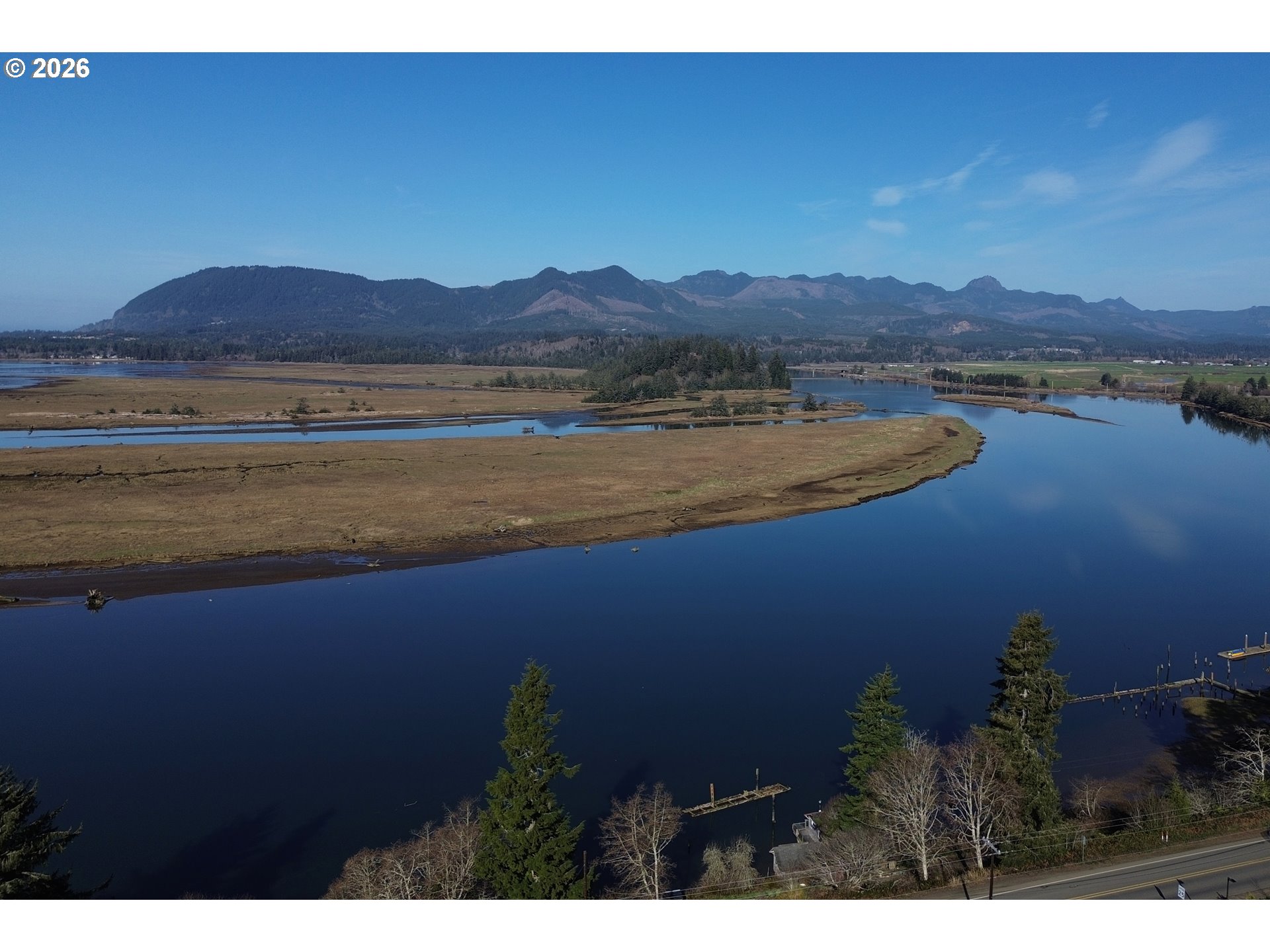 1st And Akin Wheeler, OR 97147 - Photo 18 of 41 a view of a lake with a mountain