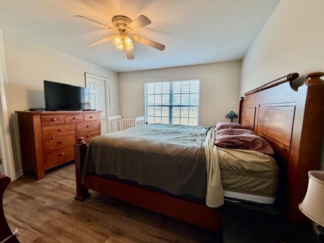 11610 Broadway Crown Point, IN 46307 - Photo 7 of 14 a bedroom with a bed and a flat screen tv