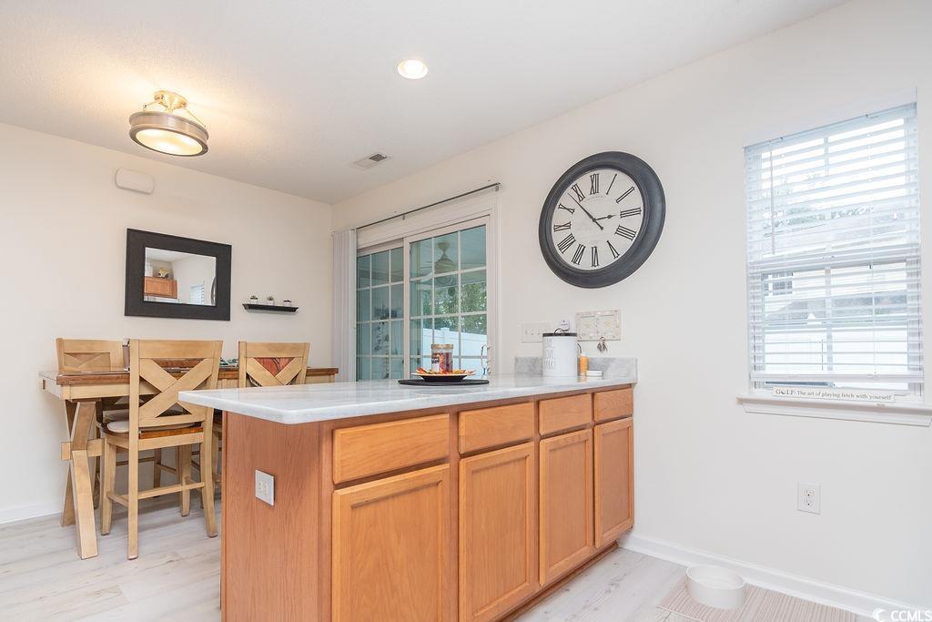 821 Sheridan Road, Unit 821 Myrtle Beach, SC 29579 - Photo 12 of 40 Kitchen featuring light hardwood / wood-style floo