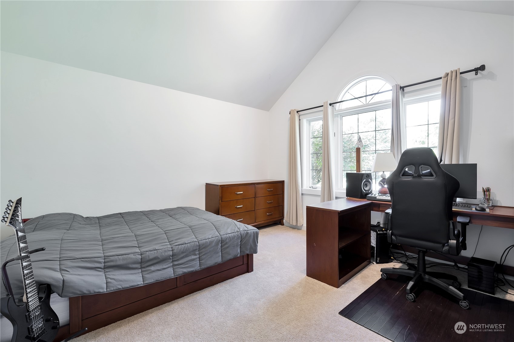 2926 184th Place Southeast Bothell, WA 98012 - Photo 15 of 24 a bedroom with a bed and wooden floor