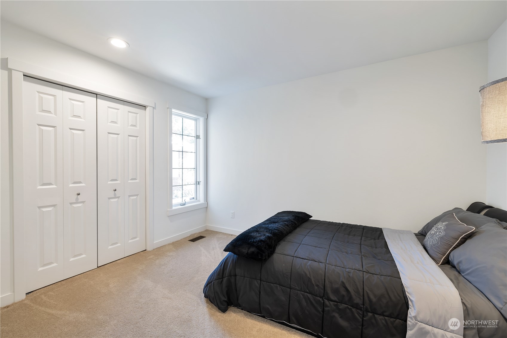 2926 184th Place Southeast Bothell, WA 98012 - Photo 17 of 24 a bedroom with a bed and a window