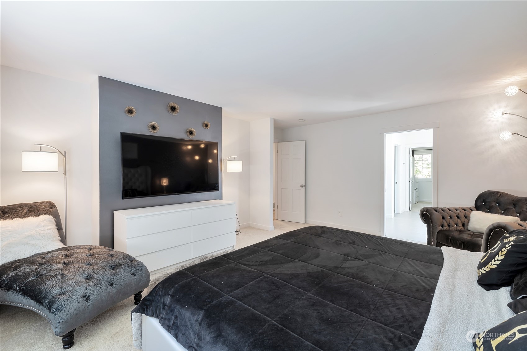 2926 184th Place Southeast Bothell, WA 98012 - Photo 10 of 24 a bedroom with a bed and a couch