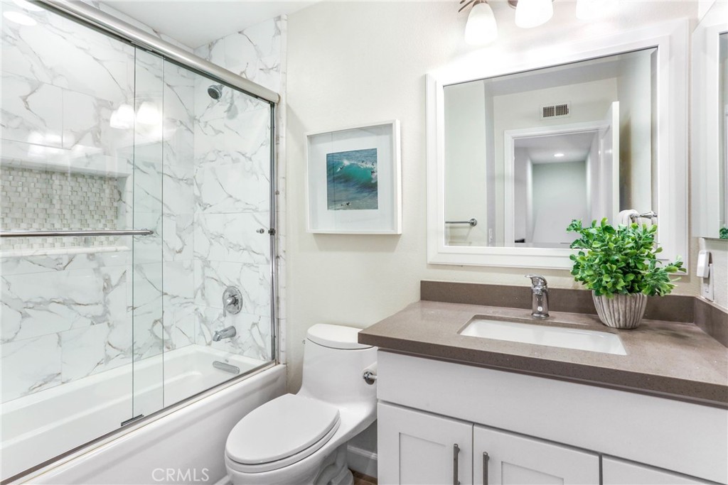 33885 Manta Court Dana Point, CA 92629 - Photo 14 of 34 a bathroom with a sink a toilet and shower
