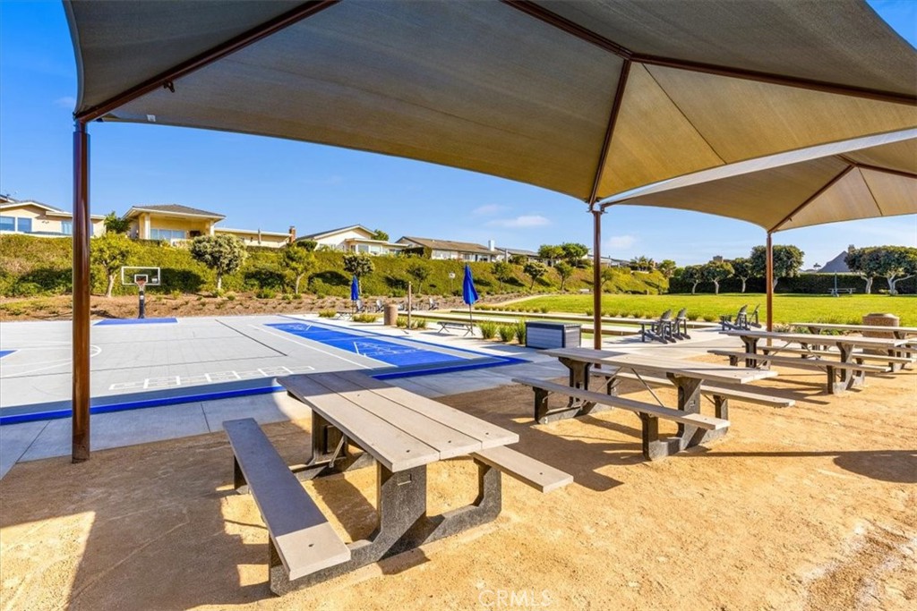 33885 Manta Court Dana Point, CA 92629 - Photo 27 of 34 a view of a patio with swimming pool