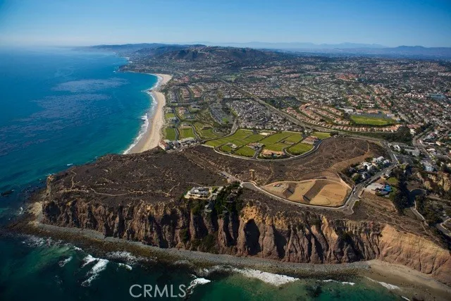a view of a swimming pool with a yard