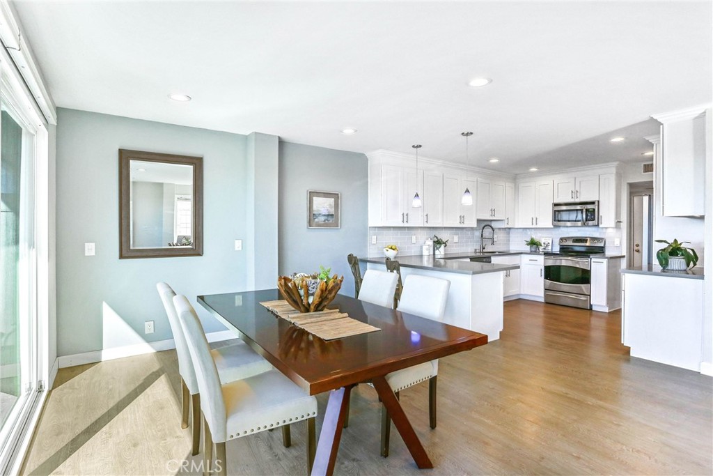 33885 Manta Court Dana Point, CA 92629 - Photo 4 of 34 a view of a dining room with furniture and wooden floor