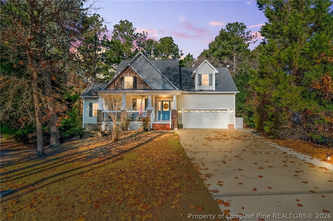 124 Riviera Lane Sanford, NC 27332 - Photo 1 of 45 a front view of a house with a yard