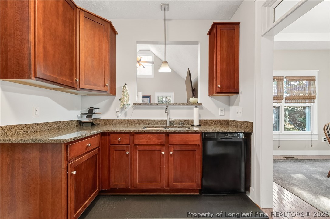124 Riviera Lane Sanford, NC 27332 - Photo 15 of 45 a kitchen with a sink and a window